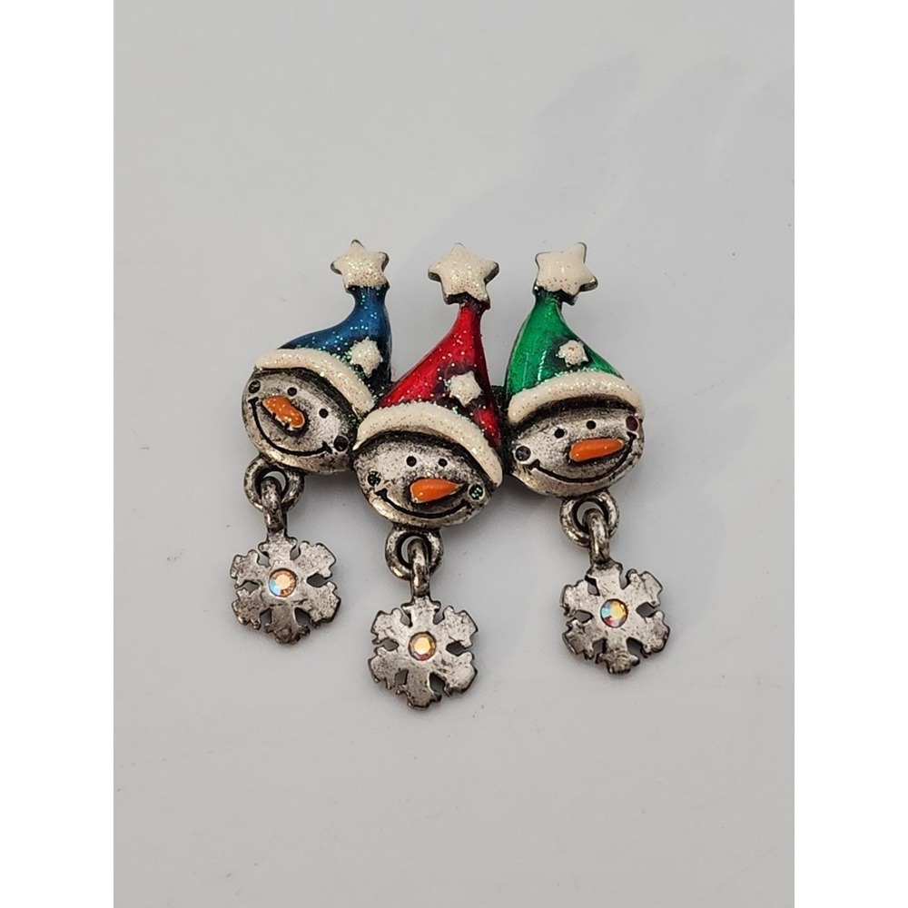 Vintage Christmas Brooch By‎ AJMC - 3 Snowmen In Hats With Dangling Snowflakes